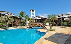 204 - Village aconchegante em frente a praia de Itacimirim
